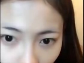 Nong Far Naked atop Bed